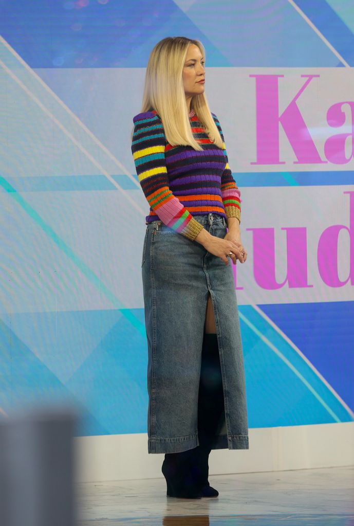 Kate Hudson in denim midi skirt and stripe sweater
