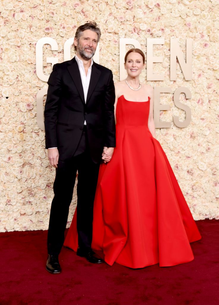 Bart Freundlich and Julianne Moore attend the 81st Annual Golden Globe Awards at The Beverly Hilton on January 07, 2024 in Beverly Hills, California. 