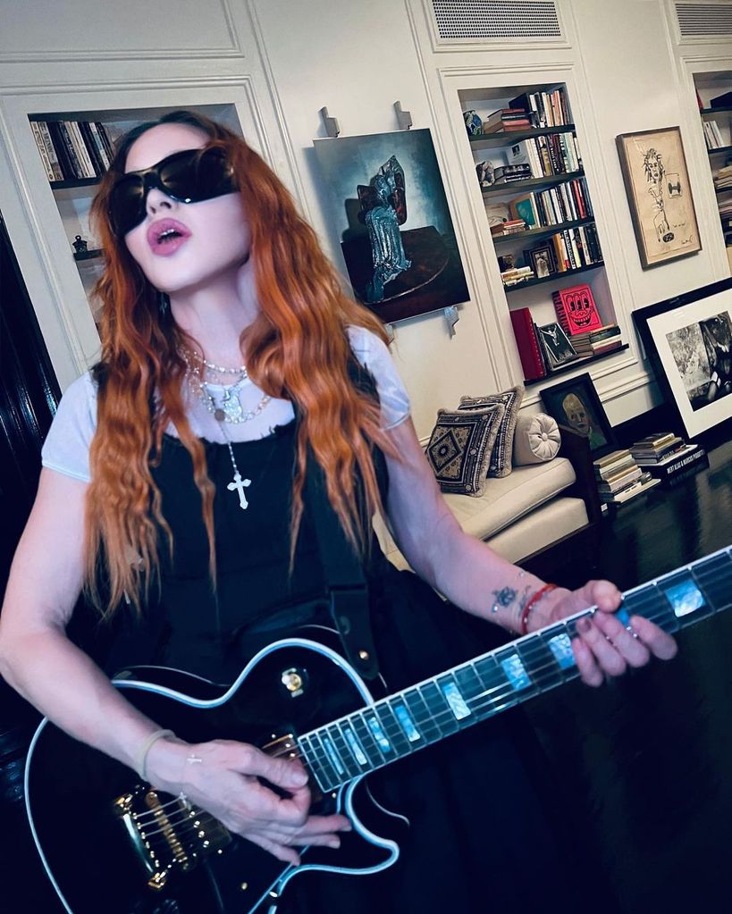 Madonna at home with her guitar in a photo shared on Instagram