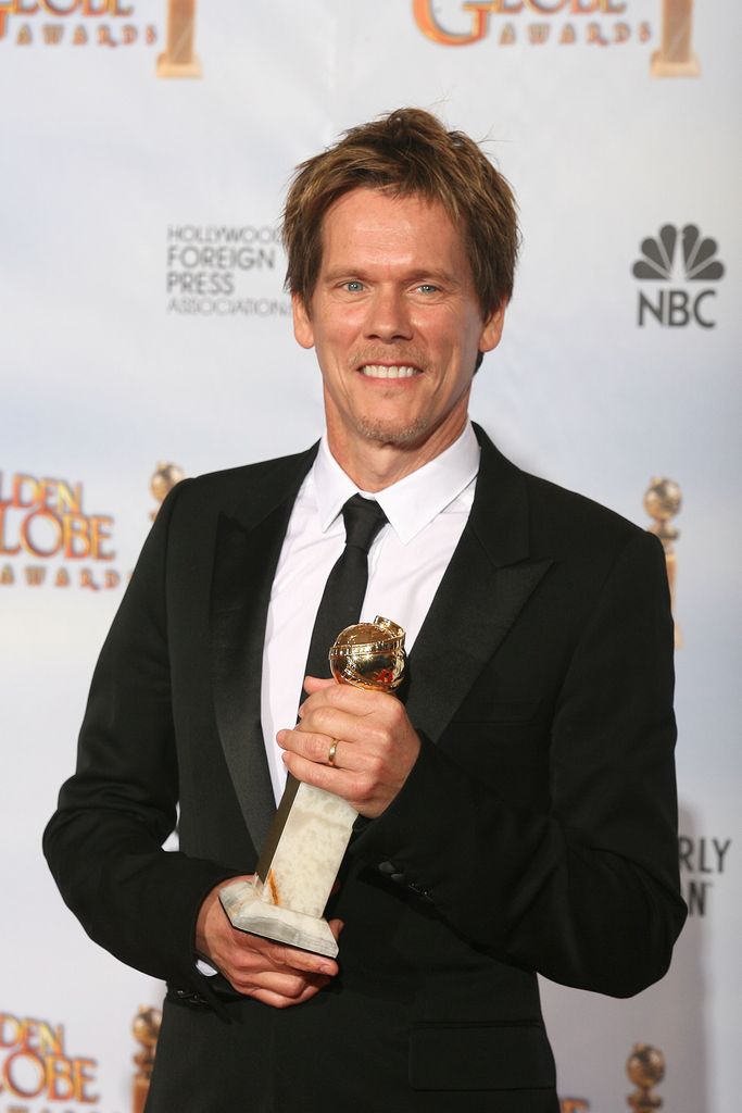 Kevin Bacon holds his award for best actor in a mini-series or TV movie for his role in 'Taking Chance' in the photo room at the 67th Annual Golden Globe Awards at the Beverly Hilton Hotel in Beverly Hills, California, January 17, 2010