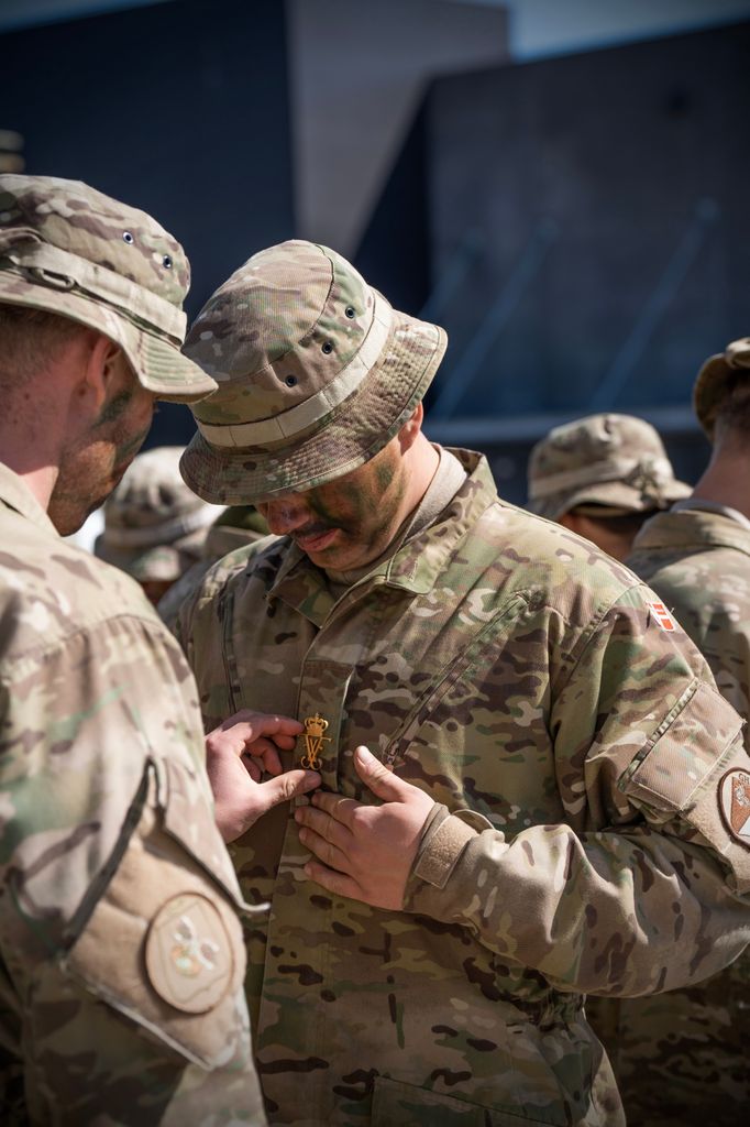 Crown Prince Christian receiving REX badge