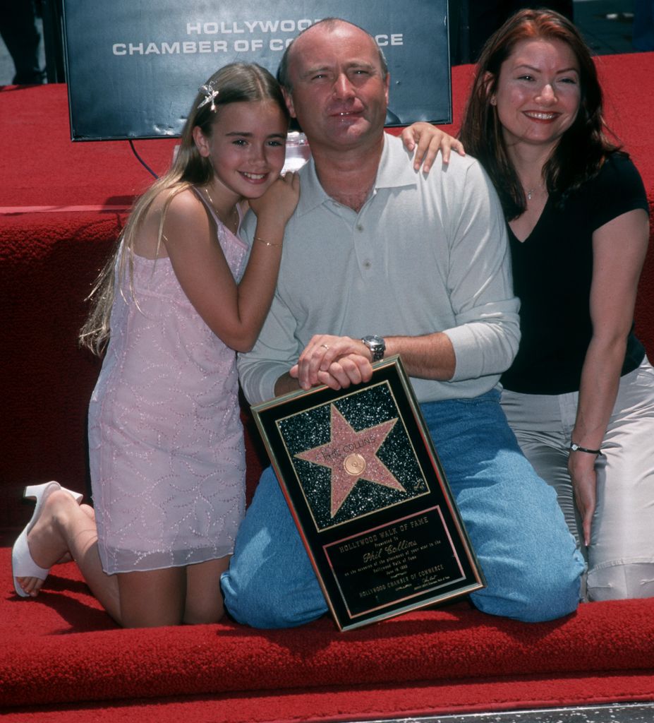 Musician Phil Collins and daughters Lily Collins and Joely Collins attend Phil Collins Receives Walk of Fame Star on June 16, 1999 in Hollywood, California.