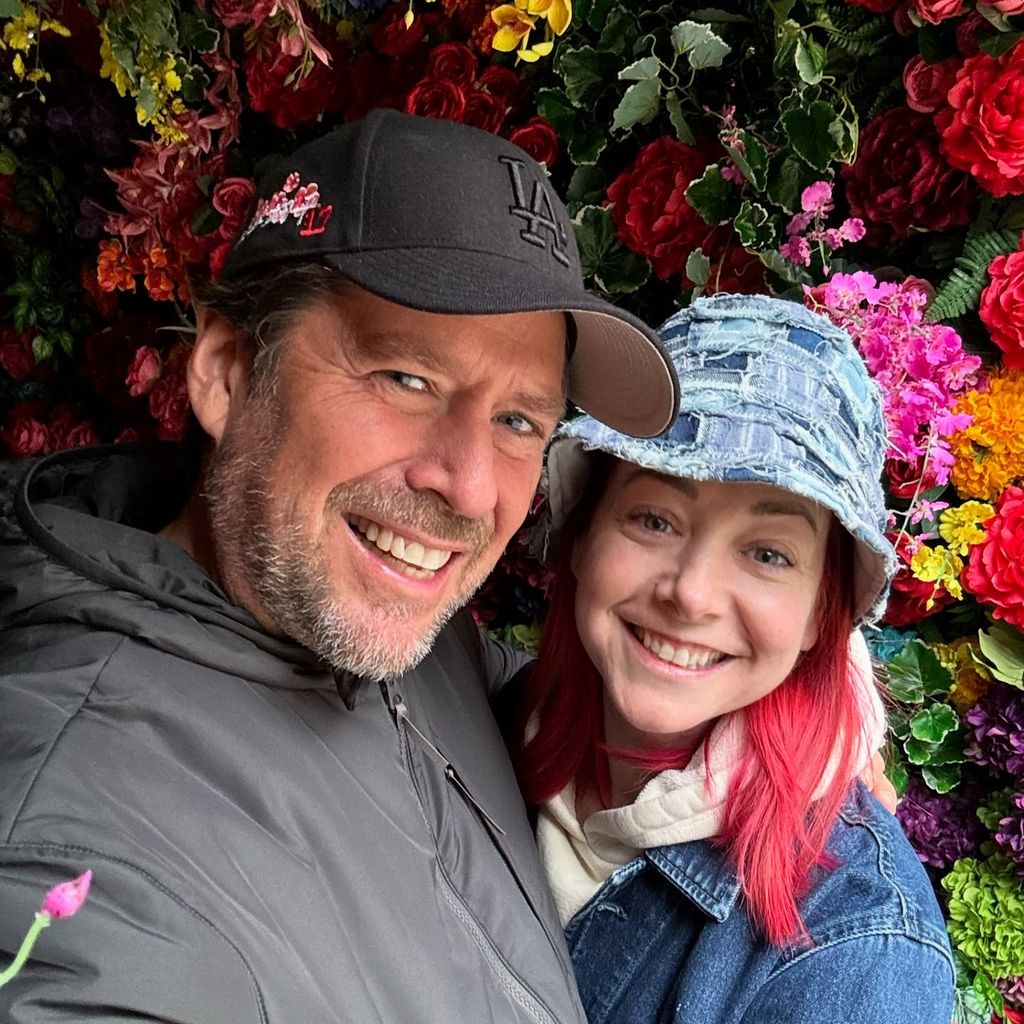 Alyson Hannigan with husband Alexis Denisof taking a selfie