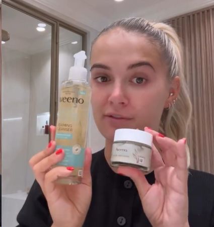 Molly-Mae with skincare products
