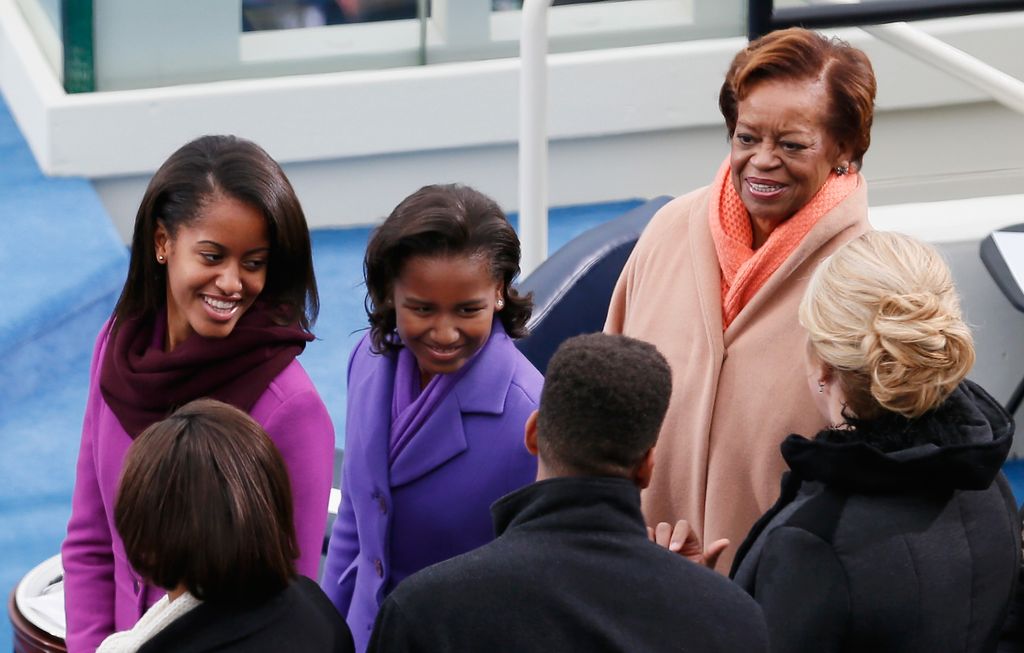 The daughters of U.S. President Barack Obama, Sasha Obama (L) and Malia Obama (C) and mother-in-law Marian Robinson at  his 2013 inauguration