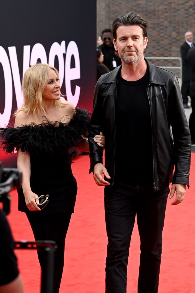 Kylie Minogue and Paul Solomons on red carpet