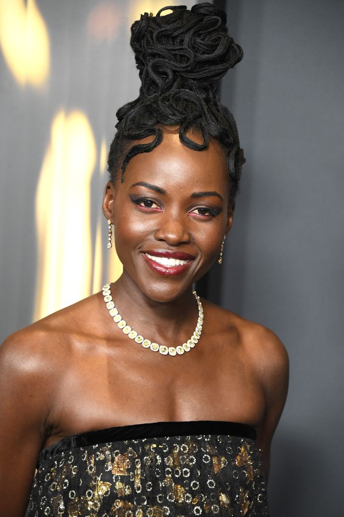 Lupita Nyong'o at the Governers Ball with an intricate hair style