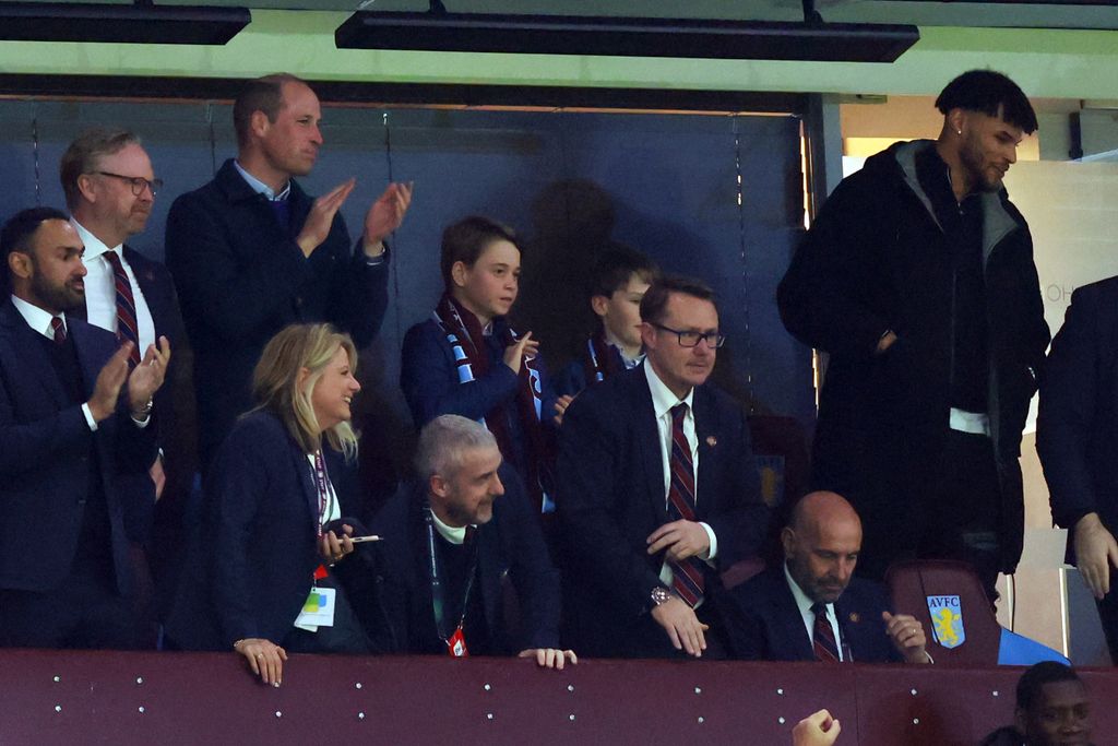 Prince William, Prince of Wales and Prince George of Wales look on alongside Tyrone Mings of Aston Villa during the UEFA Europa Conference League 2023/24 Quarter-final 