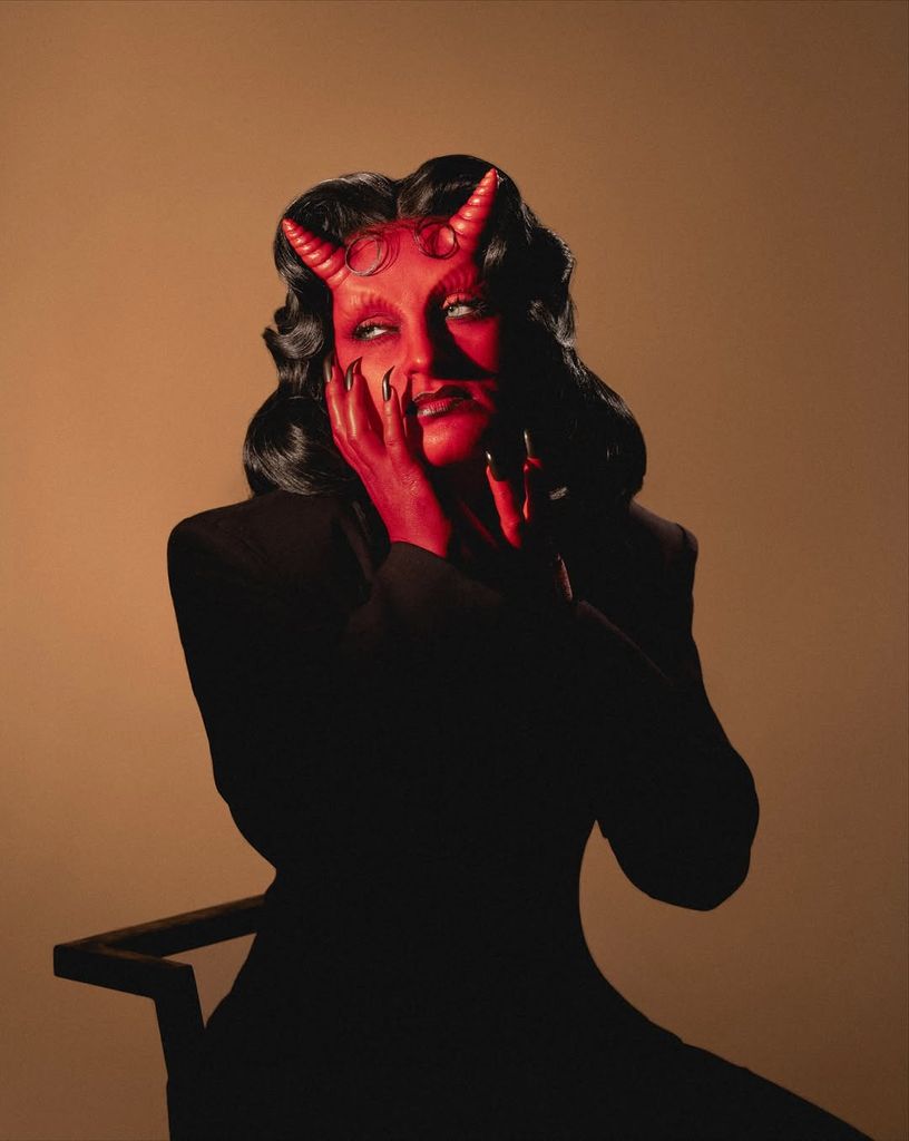 Amelia Dimoldenberg as a devil on Halloween