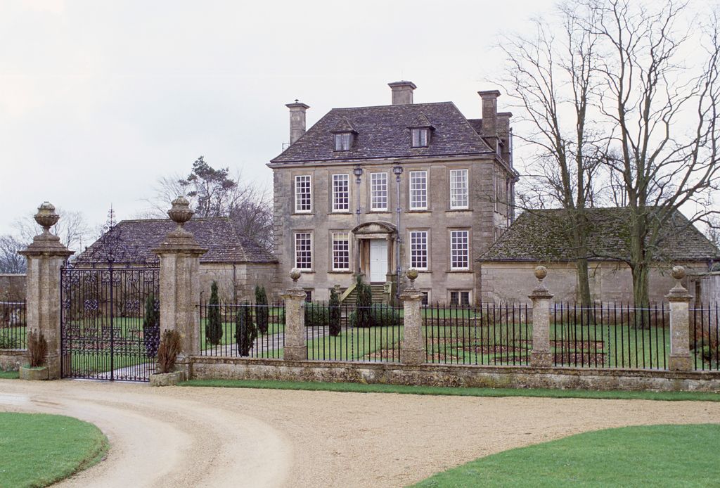 Nether Lypiatt Manor with bare trees