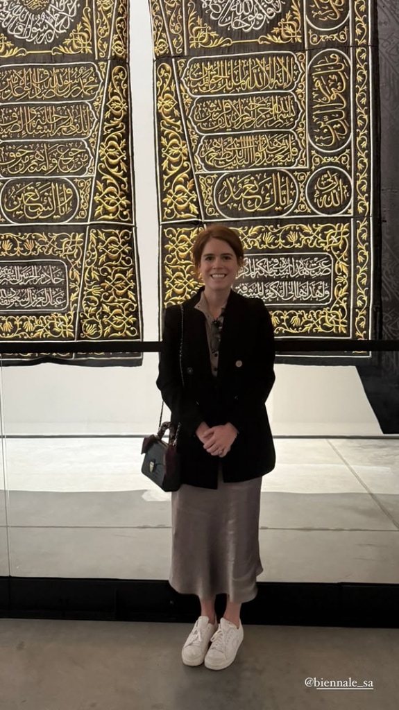 Eugenie standing in front of artwork in Jeddah