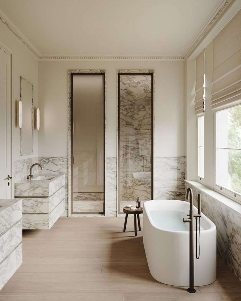 marble bathroom with freestanding bath