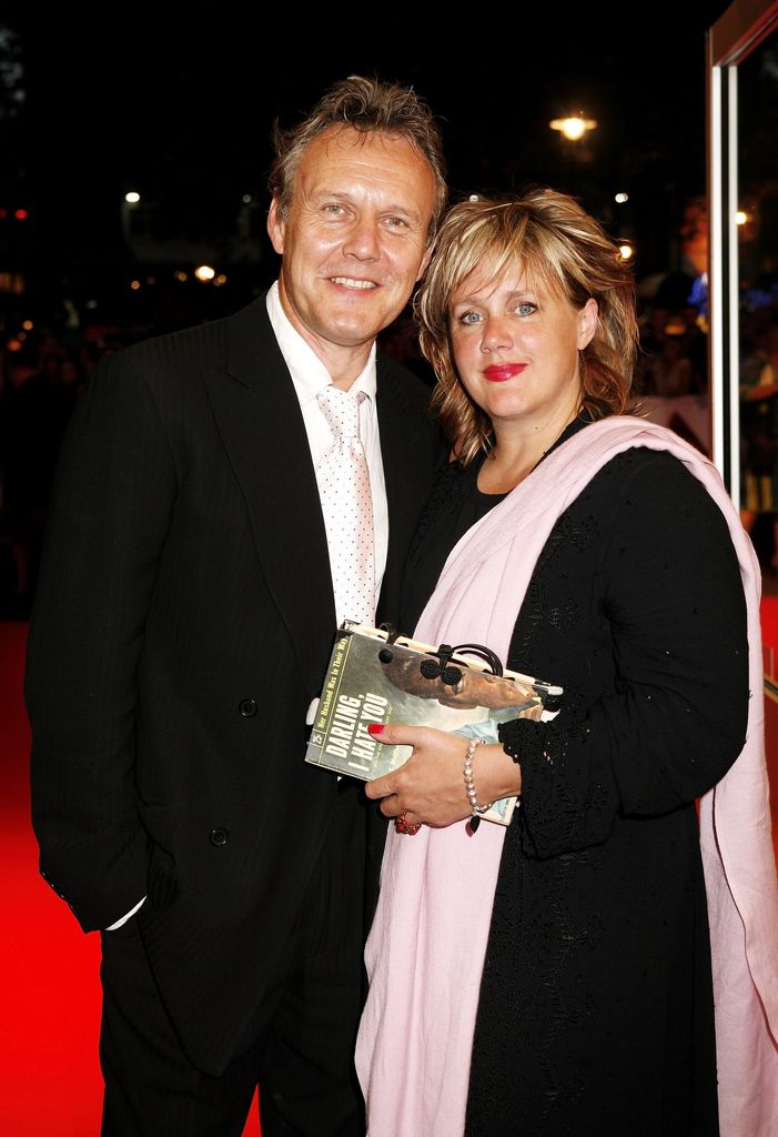 Anthony Head posing with Sarah Fisher on a red carpet