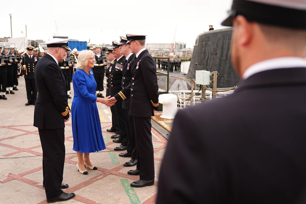 Queen Camilla, Lady Sponsor of the HMS Astute, meeting ships company officers
