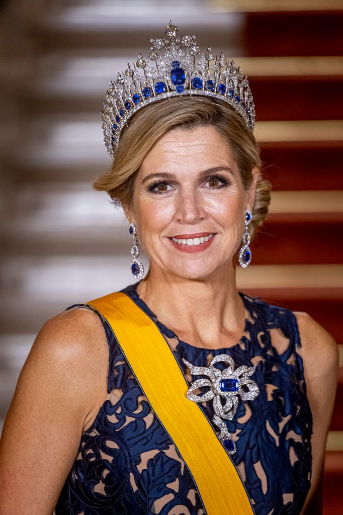 Queen Maxima in blue tiara and lace dress