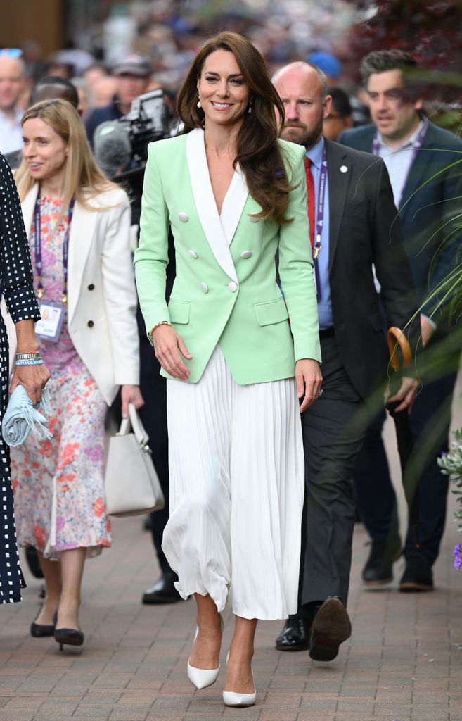 Catherine, Princess of Wales in green blazer and white skirt