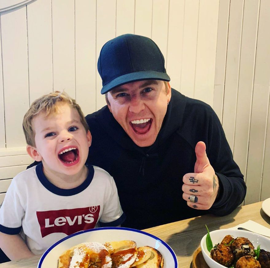 Danny Jones and his son sitting at a table