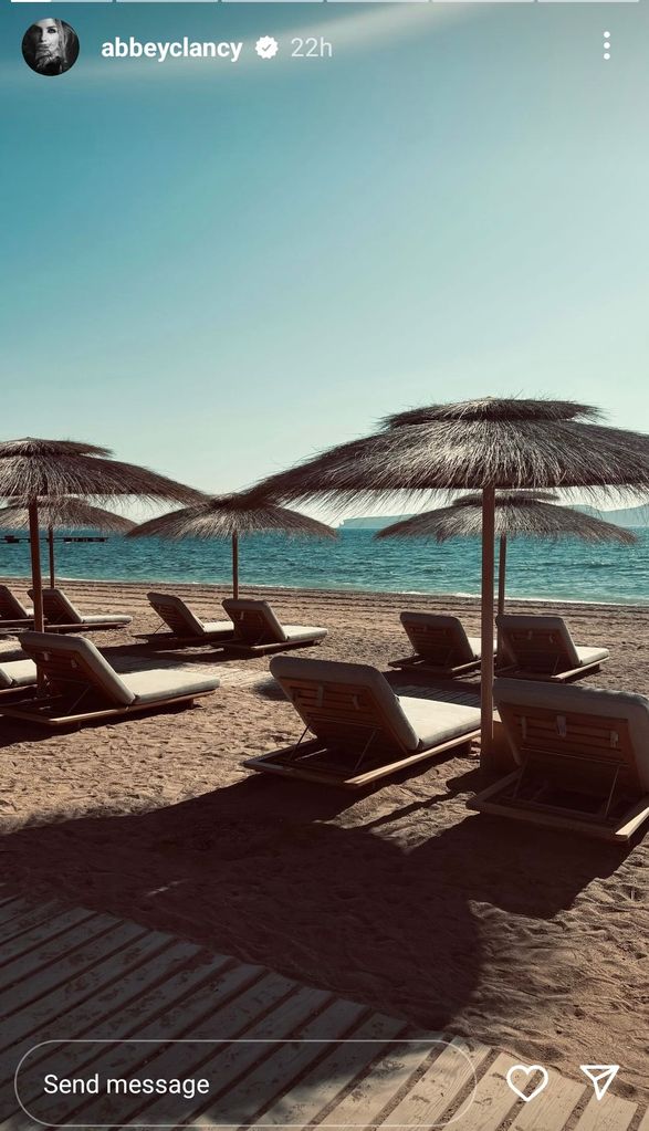 photo of sunbeds on beach