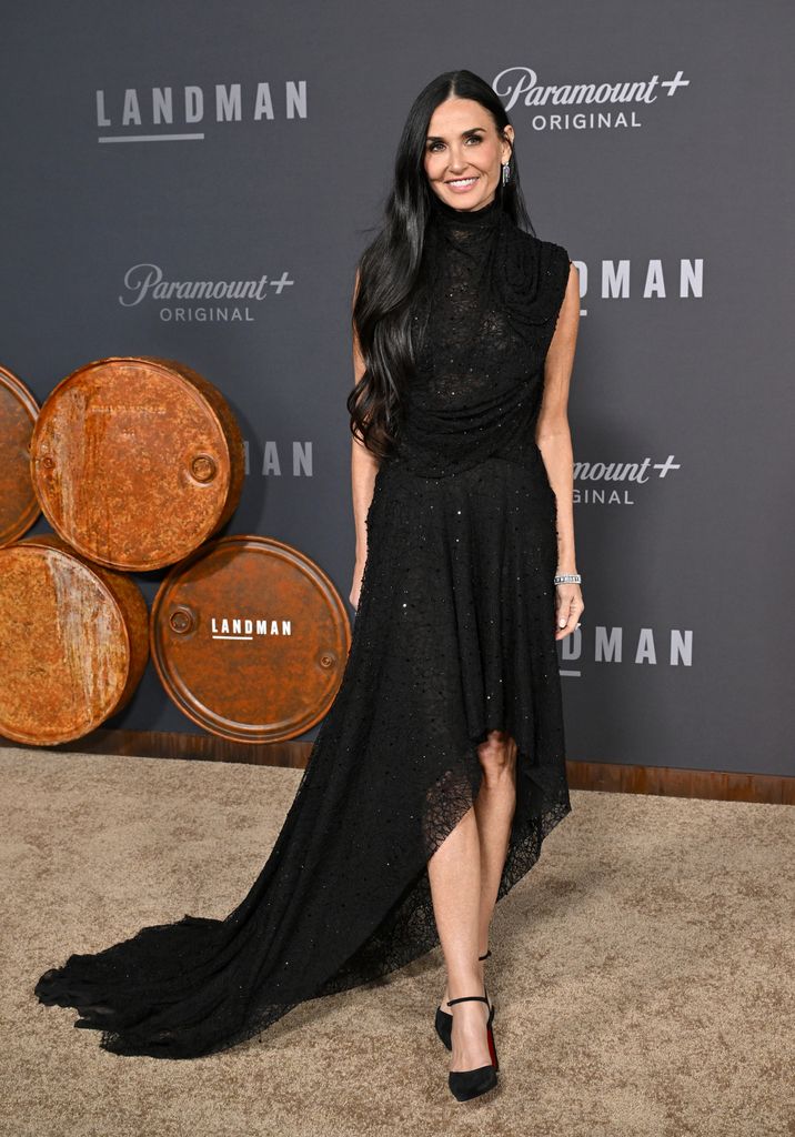 Demi Moore on red carpet in black long gown