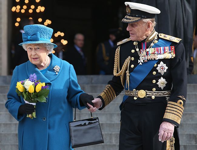 The Queen wearing blue alongside Prince Philip