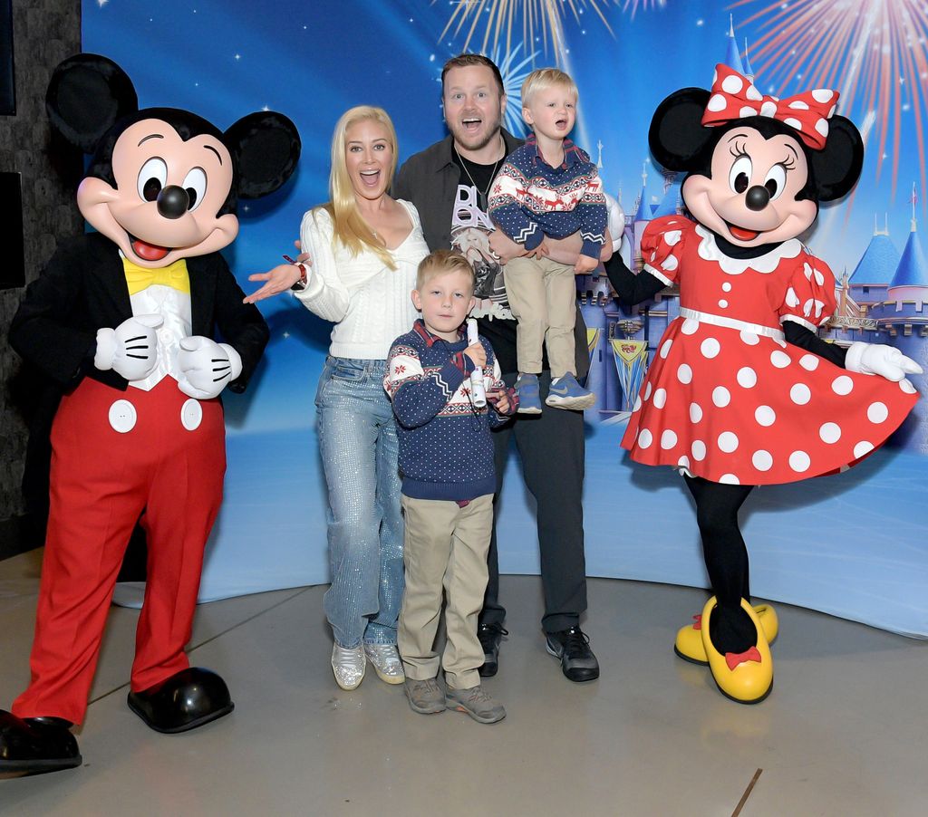 Heidi Montag, Gunner Pratt, Spencer Pratt and Ryker Pratt are greeted by Mickey Mouse and Minnie Mouse before enjoying Disney On Ice Presents Magic In The Stars at Crypto.com Arena on December 21, 2024 in Los Angeles, California.