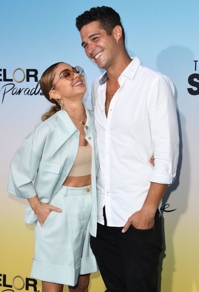 Wells Adams and Sarah Hyland laughing together at Bachelor In Paradise And The Ultimate Surfer Premiere 
