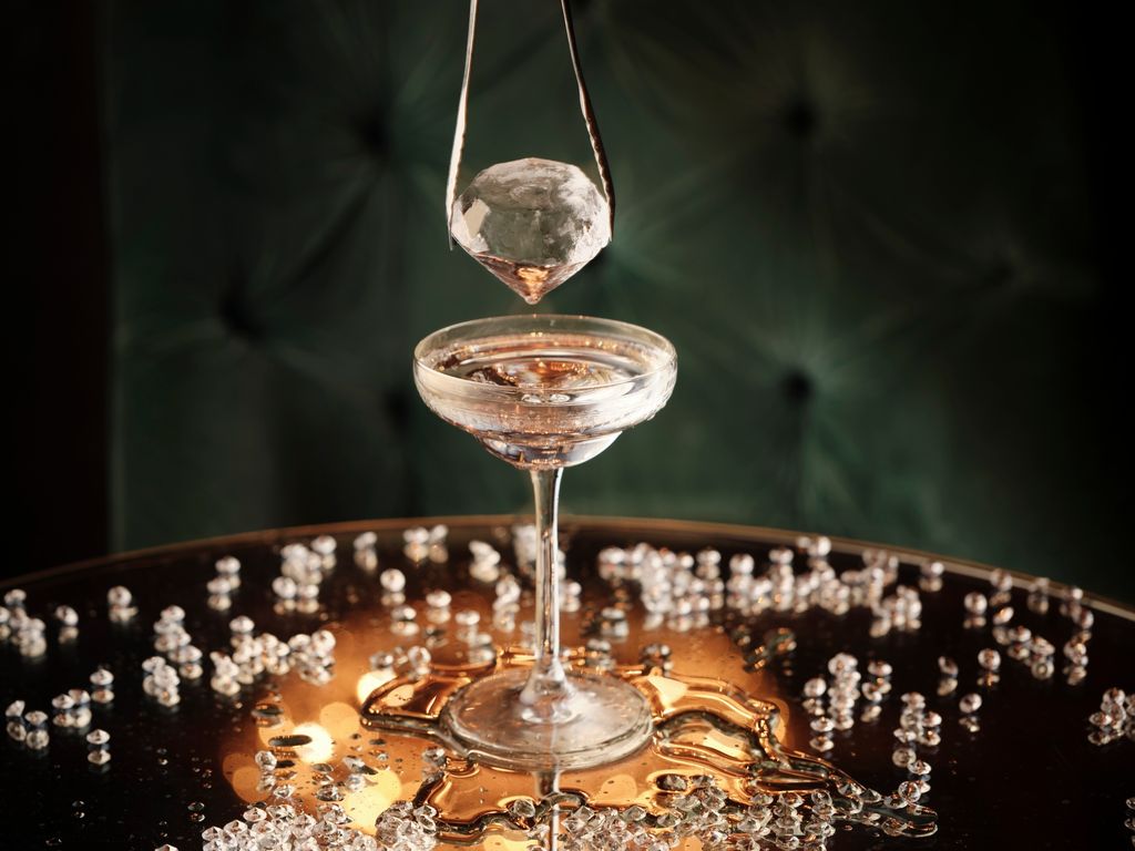 martini glass surrounded by diamonds