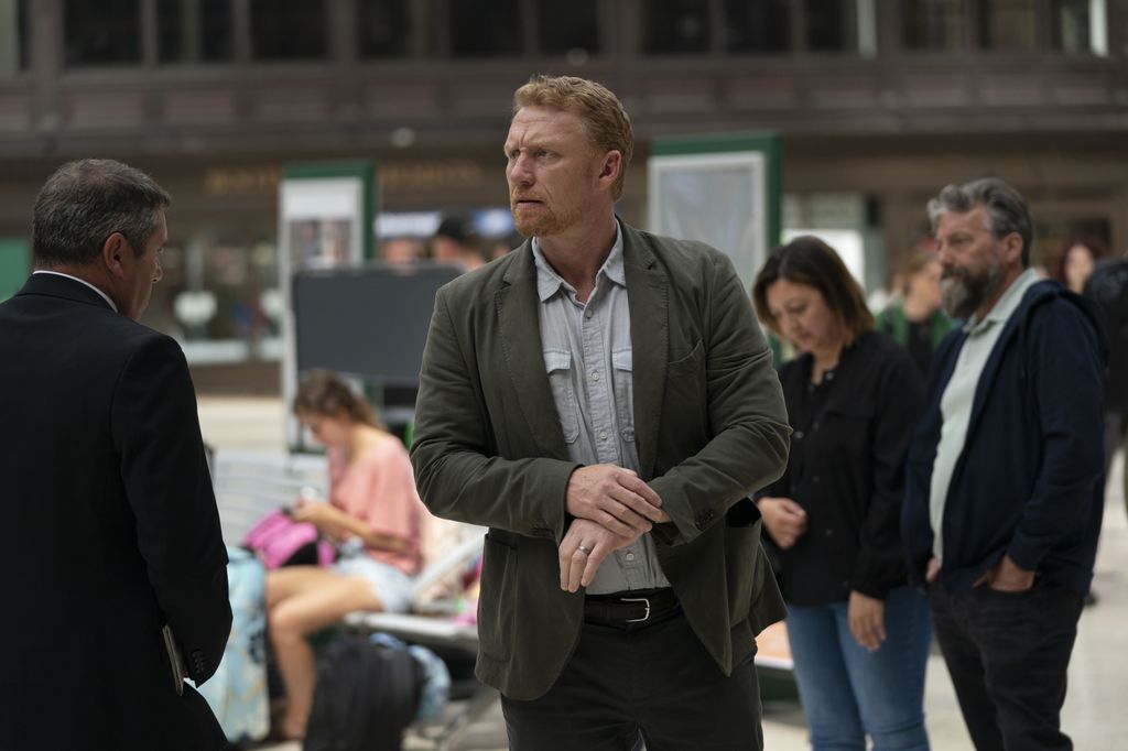 Kevin McKidd in a busy train station in Six Four
