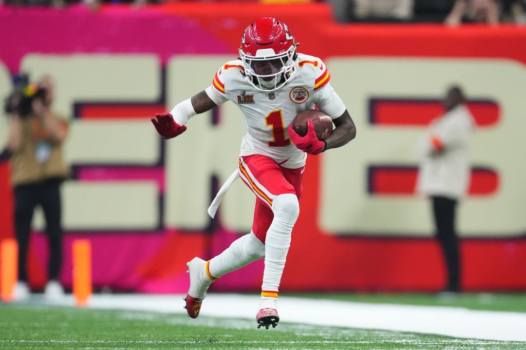 Xavier Worthy #1 of the Kansas City Chiefs runs with the ball against the Philadelphia Eagles during Super Bowl LIX at Caesars Superdome on February 9, 2025 in New Orleans, Louisiana