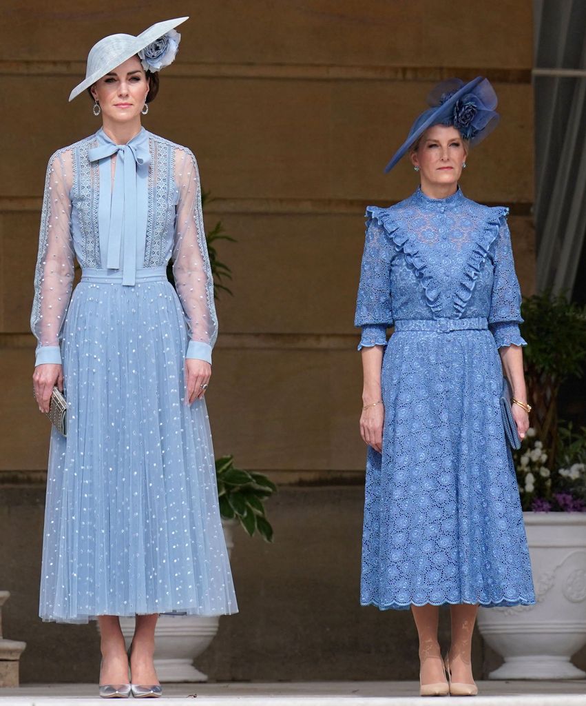 Princess Kate on the left in a blue dress and Duchess Sophie on the right in a blue dress