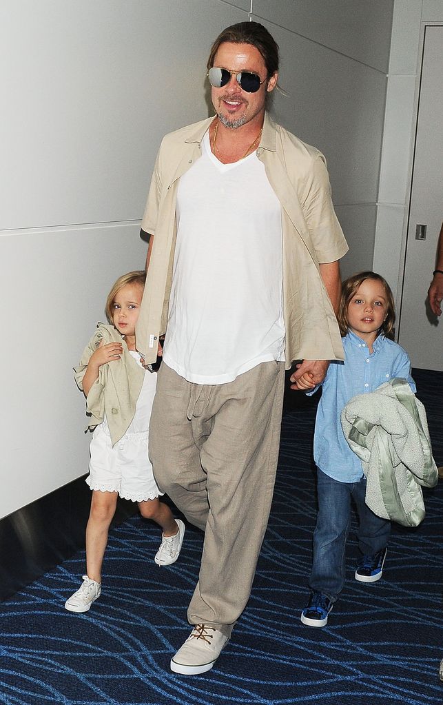 Brad Pitt, Knox Jolie-Pitt and Vivienne Jolie-Pitt are seen on July 30, 2013 in Tokyo, Japan