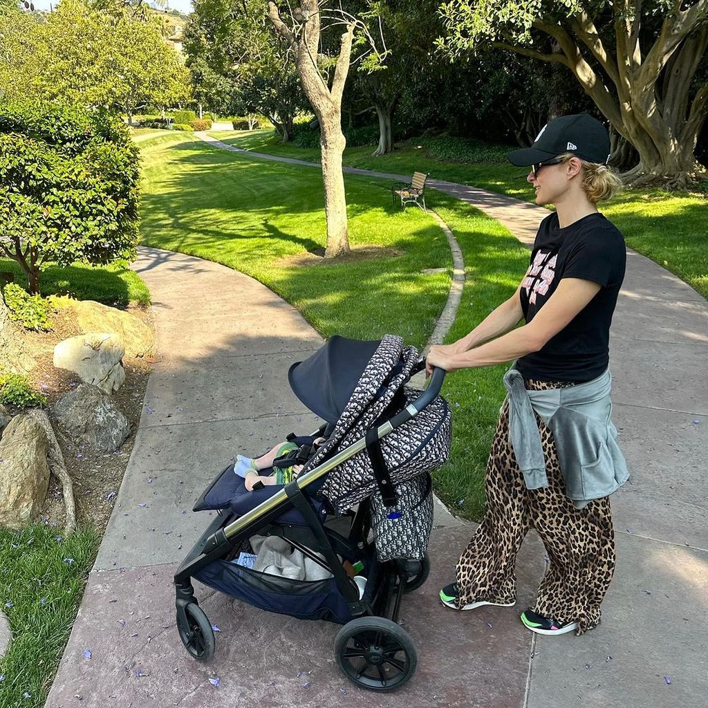 Paris Hilton on a stroll in the park with baby Phoenix