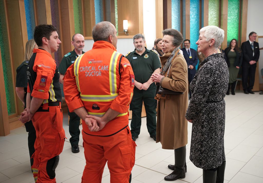 Princess Anne speaks to members of the critical care team