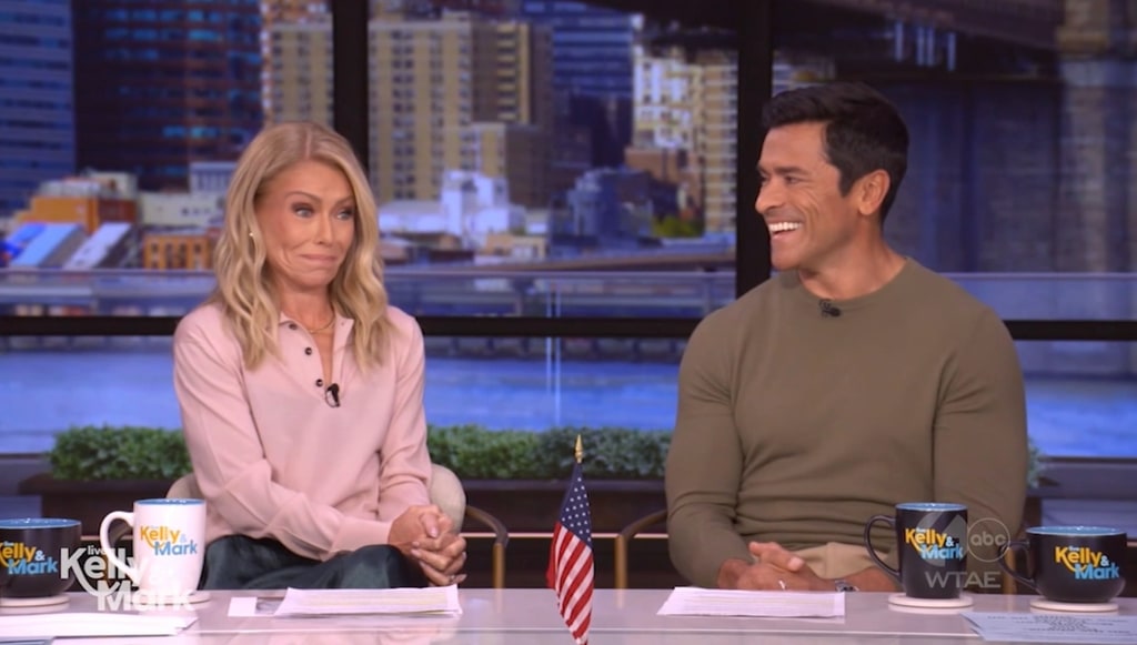 Kelly Ripa in pink shirt and Mark Consuelos in green top in LIVE studio