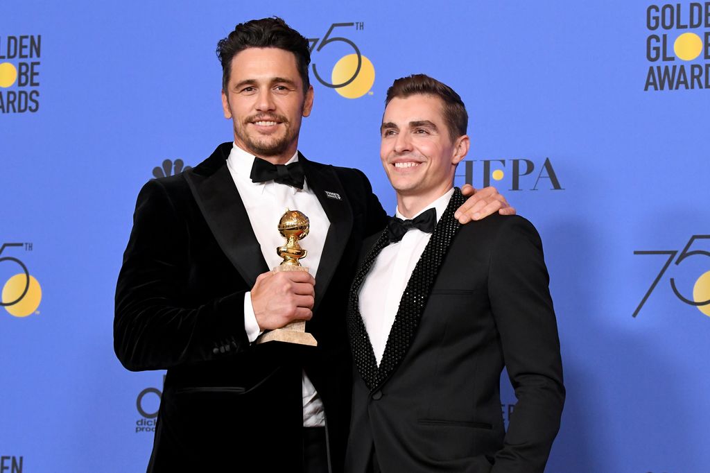 James Franco and Dave Franco in the press room during The 75th Annual Golden Globe Awards
