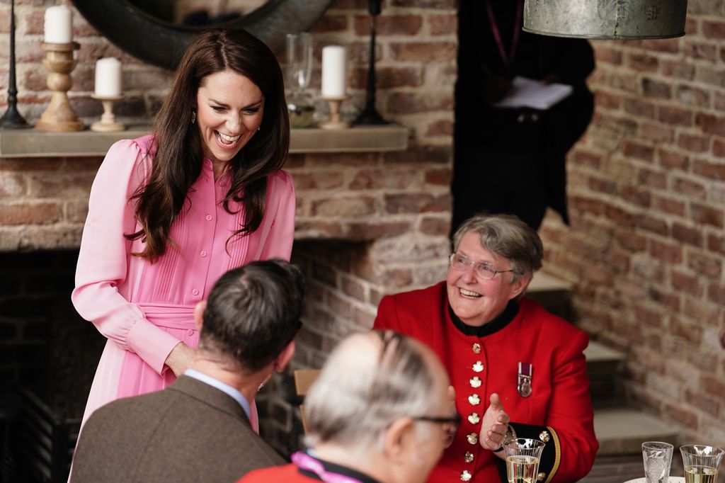 Kate Middleton giggles with Chelsea pensioners