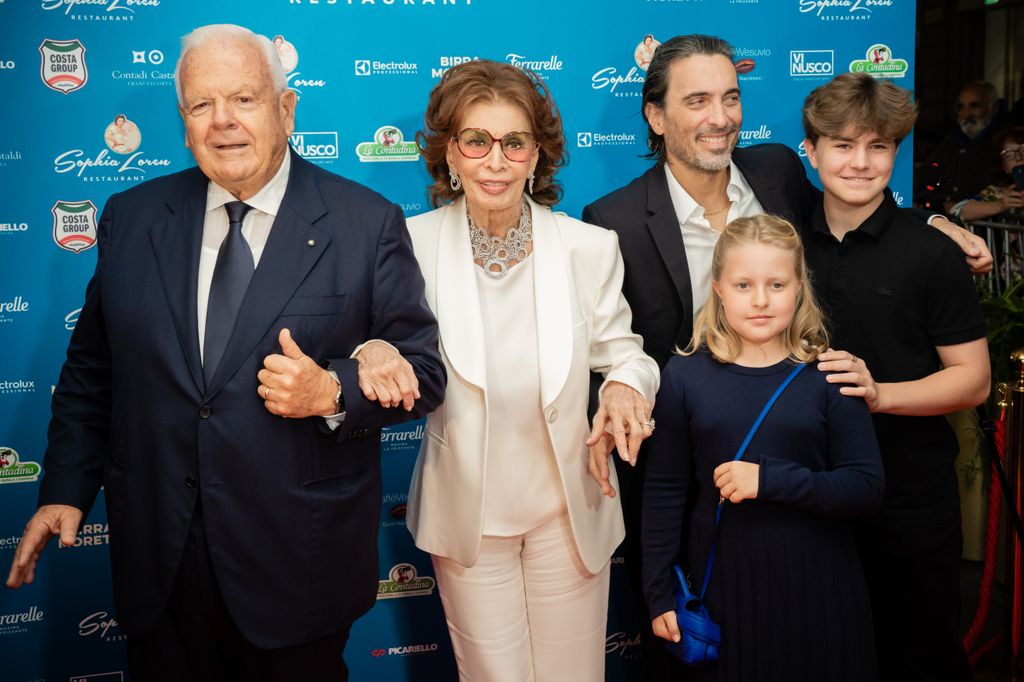 Italian entrepreneur Luciano Cimmino, Italian actress Sophia Loren with her son Carlo Ponti jr and her grandchildren Beatrice and Vittorio, during the inauguration of the Sophia Loren Restaurant in 2022