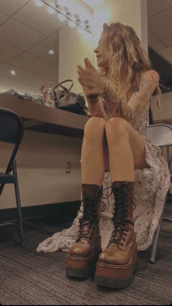 Paris Jackson dressed in a ruffled dress and platform boots in an image shared on her Instagram