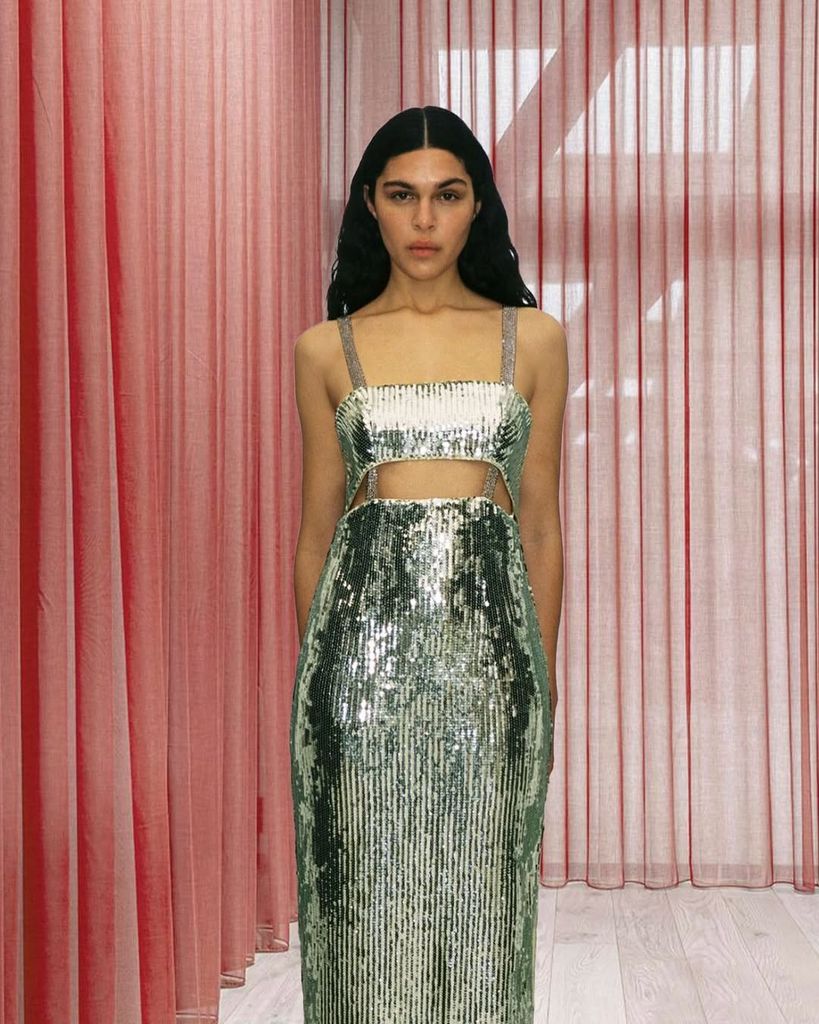 model wearing silver dress