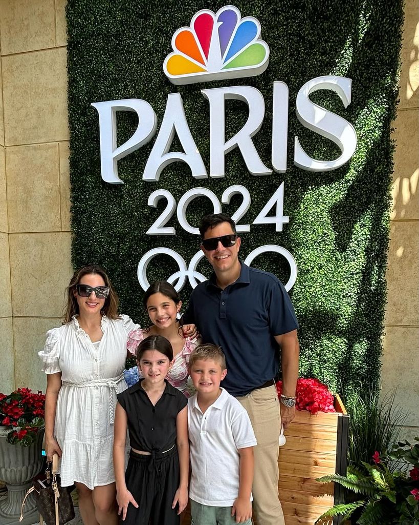 Tom Llamas with his wife and three kids at Paris Olympics