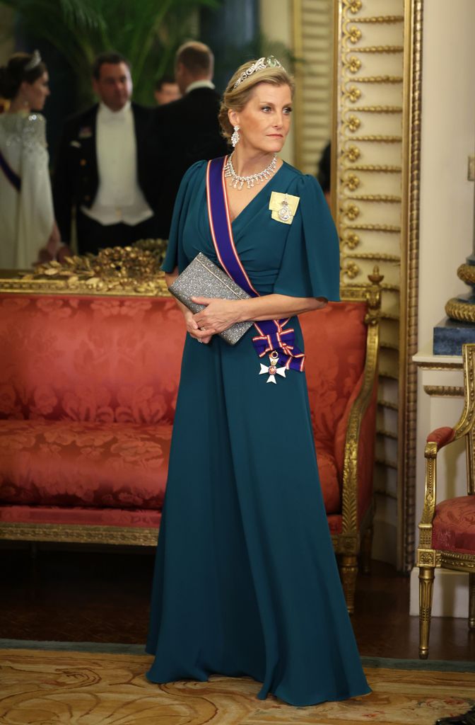 sophie wearing petrol blue gown and tiara