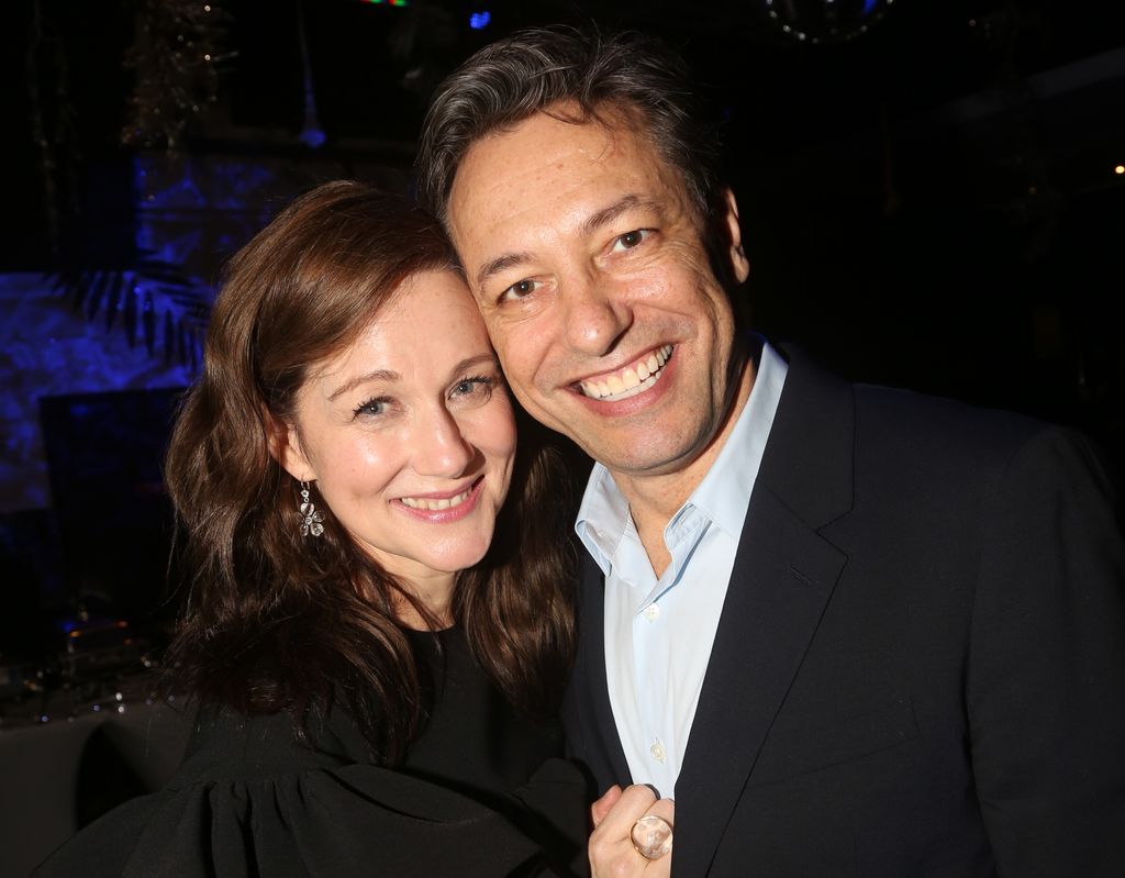 Laura Linney posing with husband Marc Schauer