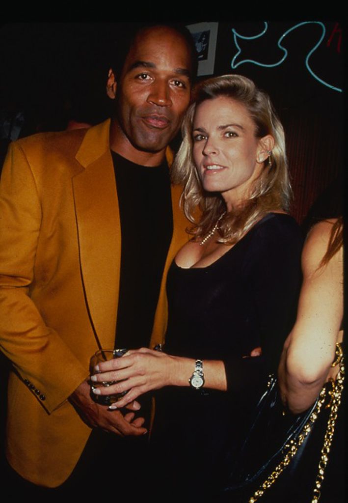 Portrait of American former foorball player OJ Simpson and his wife, Nicole Brown (1959 - 1994), as they attend a party at the Harley Davidson Cafe, New York, New York, 1993. Simpson was tried for the murder of his wife (on June 12, 1994) and, though he was acquitted in the murder trial, he was found guilty of wrongful death in a subsequent civil suit--still later, he was found guilty of other felony charges (unrelated to the murder) and convicted in 2008.