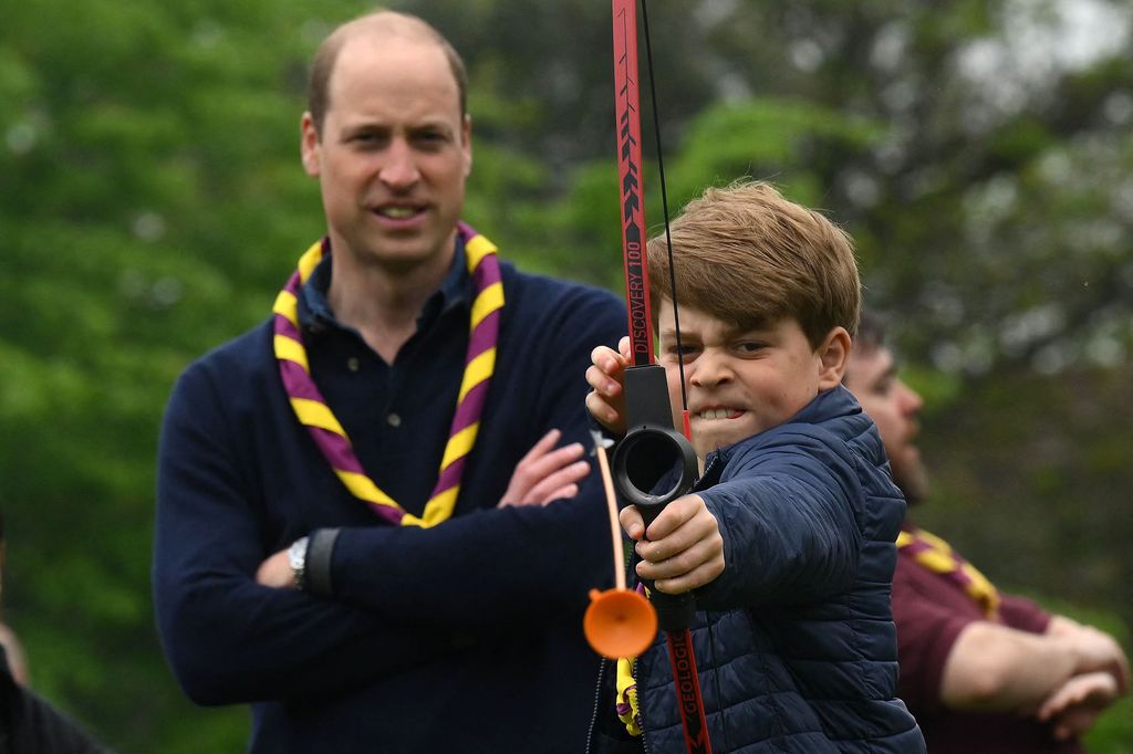 Prince George tried his hand at archery during their visit