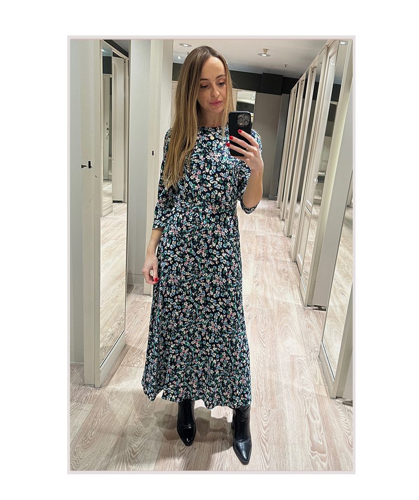 Hollie Brotherton styled the trending M&S midi dress with knee-high boots
