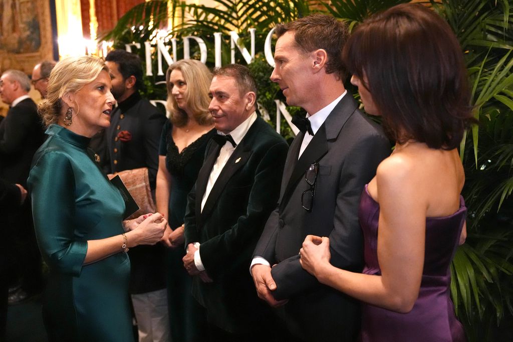 WINDSOR, ENGLAND - JANUARY 28: Sophie, Duchess of Edinburgh speaks to Jools Holland, Benedict Cumberbatch and Sophie Hunter in the Grand Reception Room after they attended the premiere of Prime Video's Finding Harmony: A King's Vision, at Windsor Castle on January 28, 2026 in Windsor, England. The documentary outlines Charles' philosophy of harmony, which encourages people to see themselves as part of nature, not apart from nature, and will be available on Prime Video from Friday February 6. (Photo by Jonathan Brady - Pool/Getty Images)