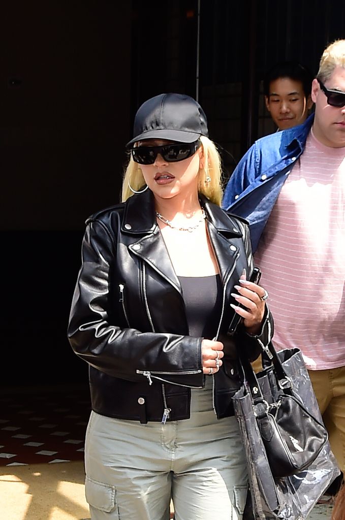 Christina Aguilera is seen walking in soho in a leather jacket