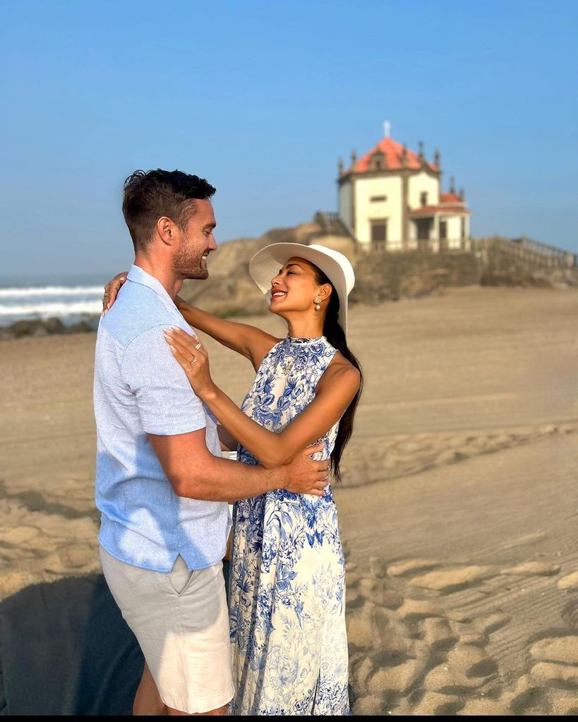 Nicole Scherzinger and Thom Evans on the beach after his proposal
