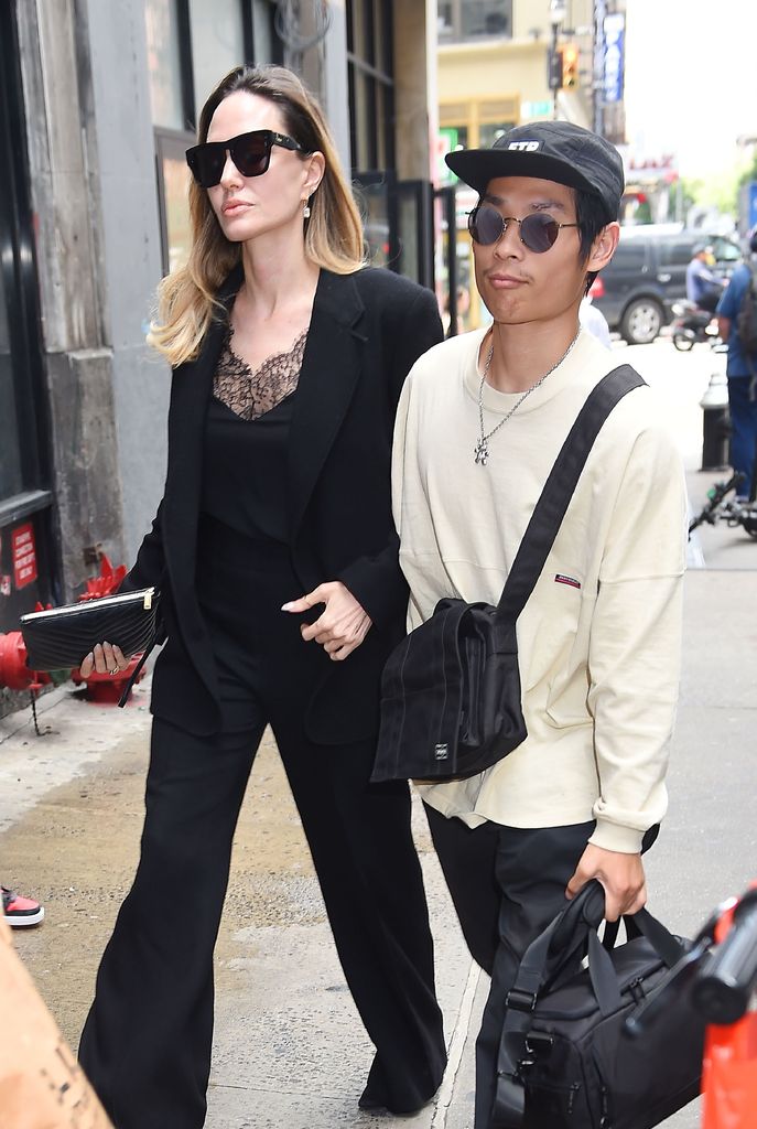 Angelina Jolie and Pax Thien Jolie-Pitt are seen out and about on August 16