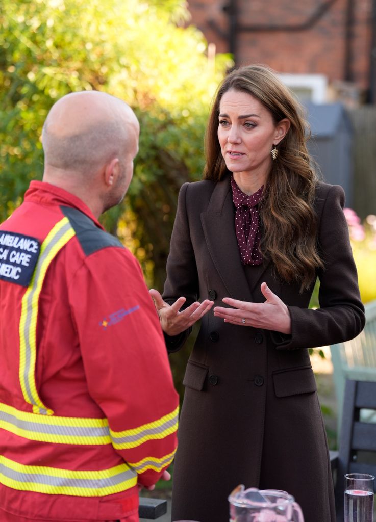 Princess Kate speaking to an emergency worker